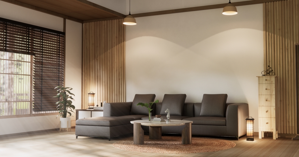Sala moderna con lambrín tipo madera en tonos claros y decoración contemporánea.